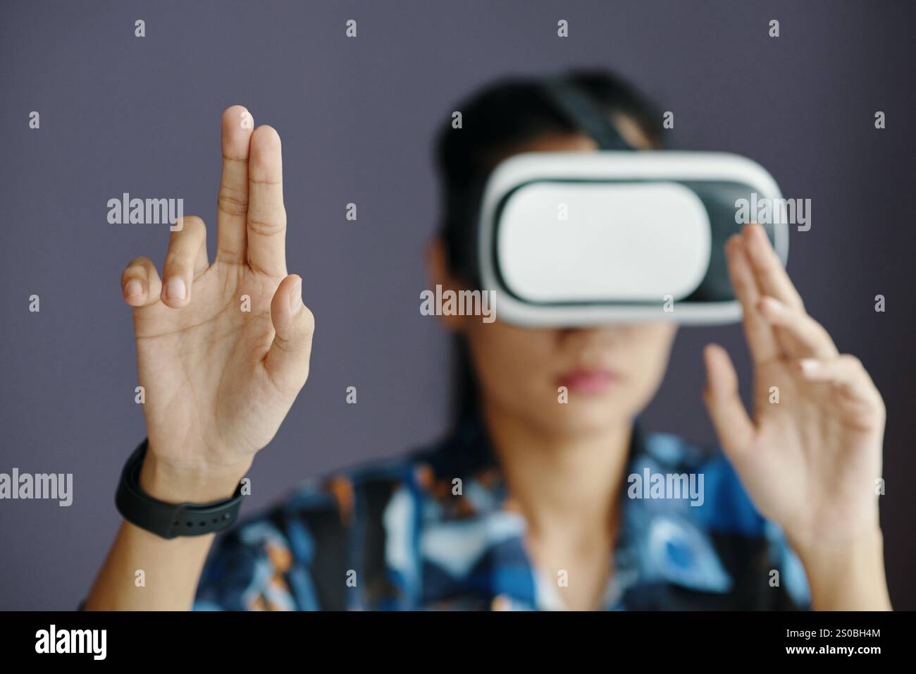 Unrecognizable Female Office Worker Using VR Headset Stock Photo