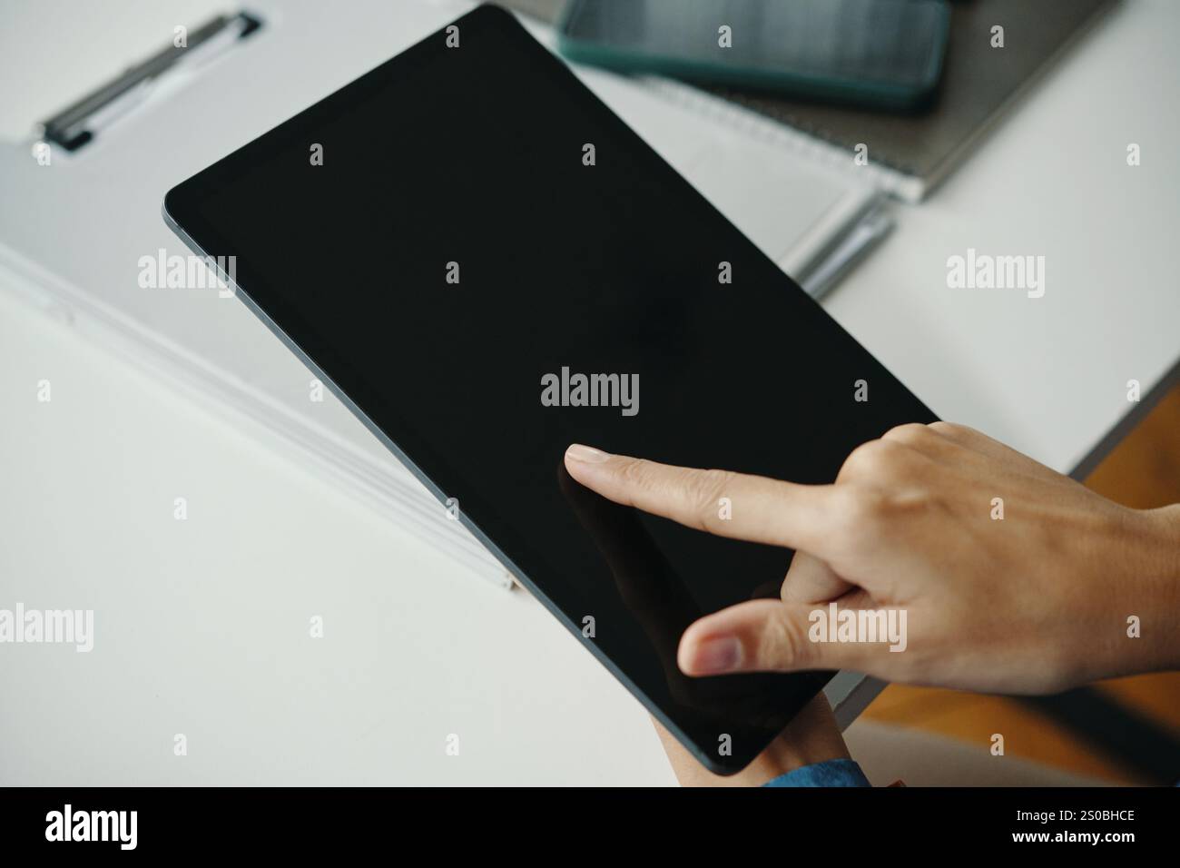 Unrecognizable Woman Using Digital Tablet Stock Photo