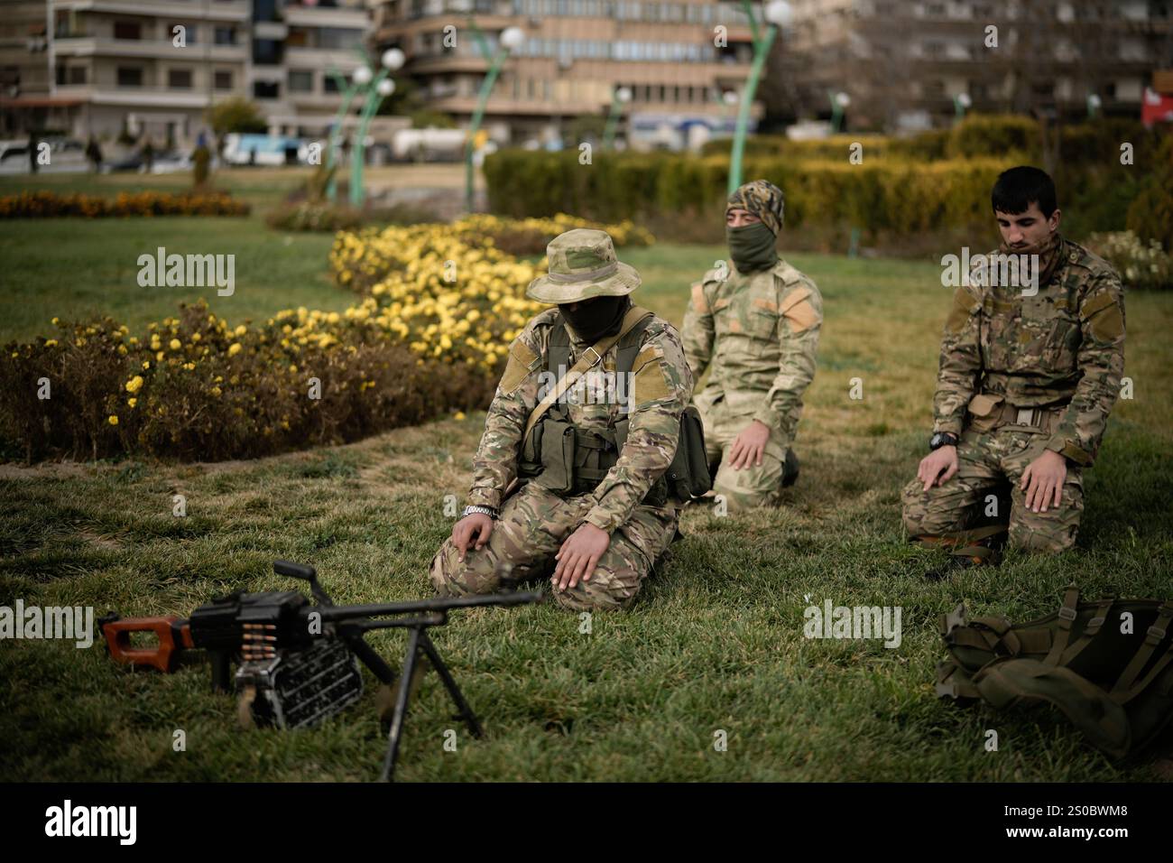 Members of the armed forces, former rebels, of the new Syrian ...