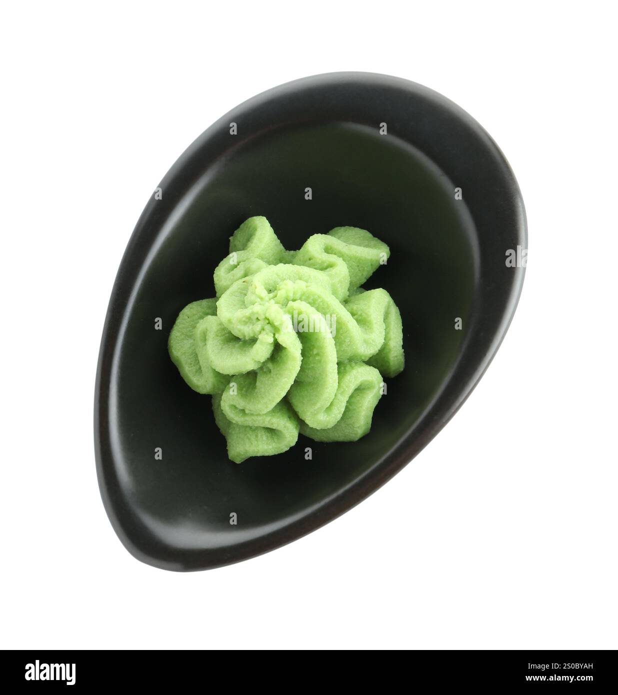 Hot wasabi paste in gravy boat isolated on white, top view Stock Photo