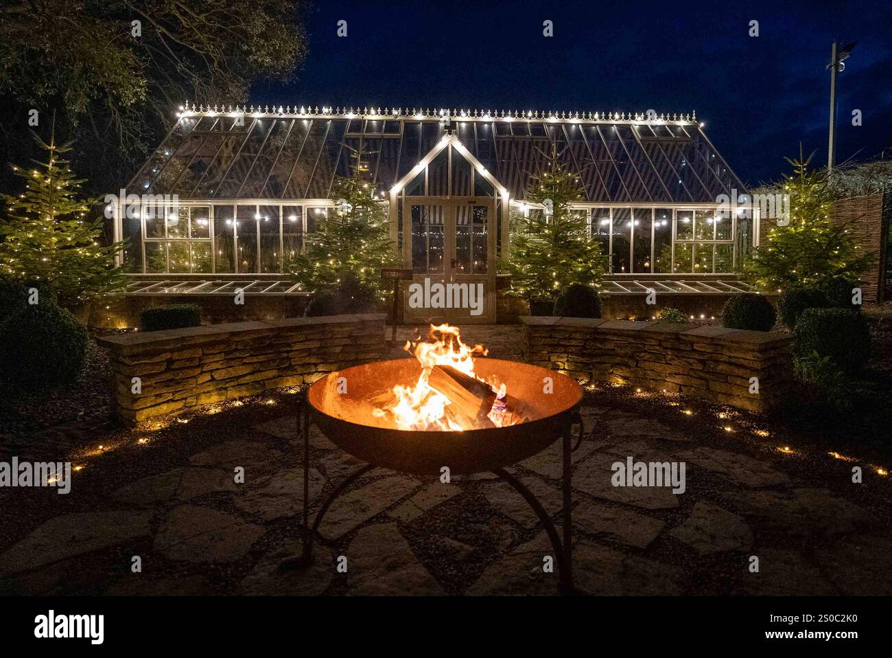 Firepit at the Greenhouse, Le Manoir aux Quat'Saisons, nighttime Stock Photo