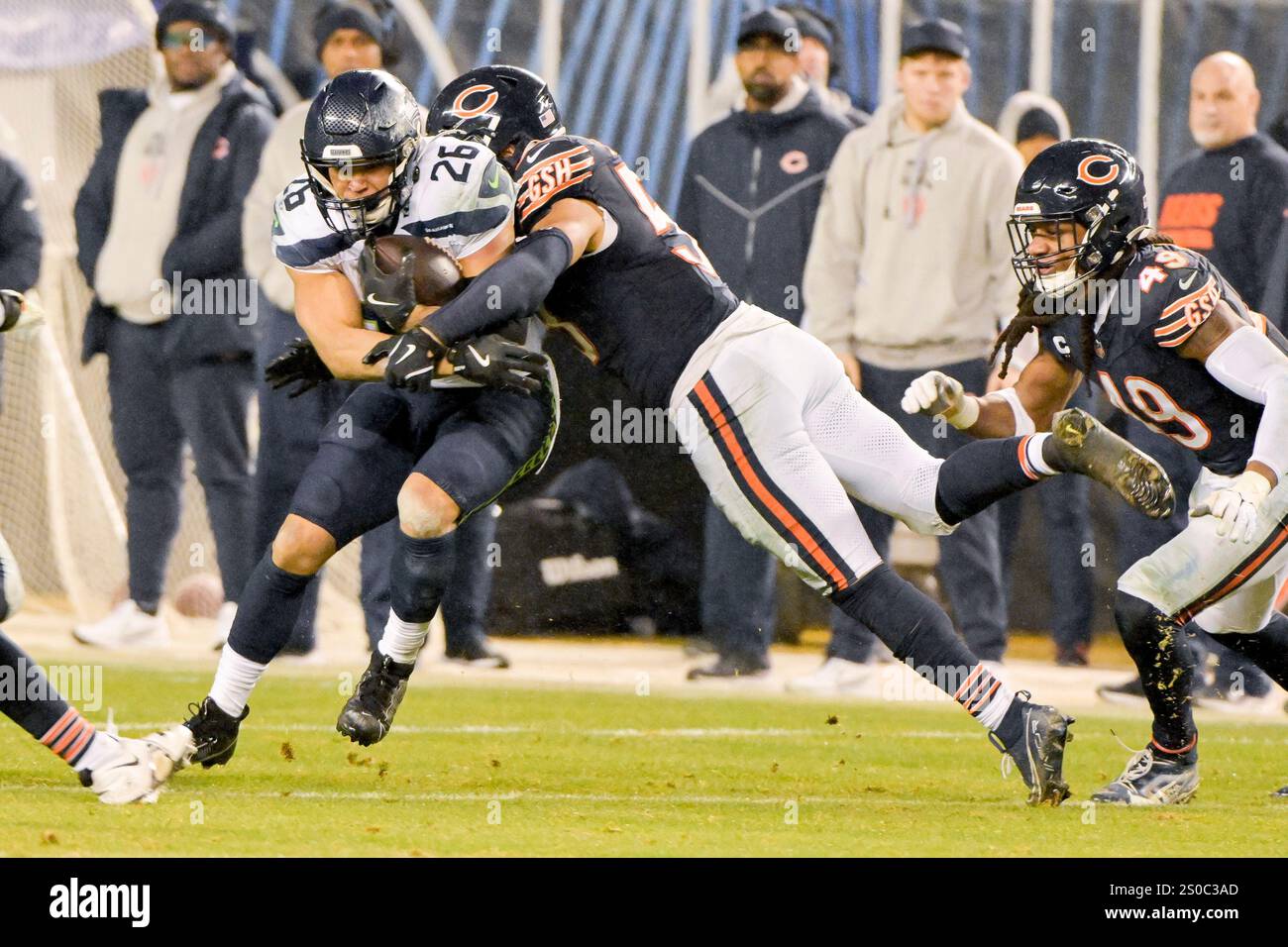 Seattle Seahawks running back Zach (26) is tackled by