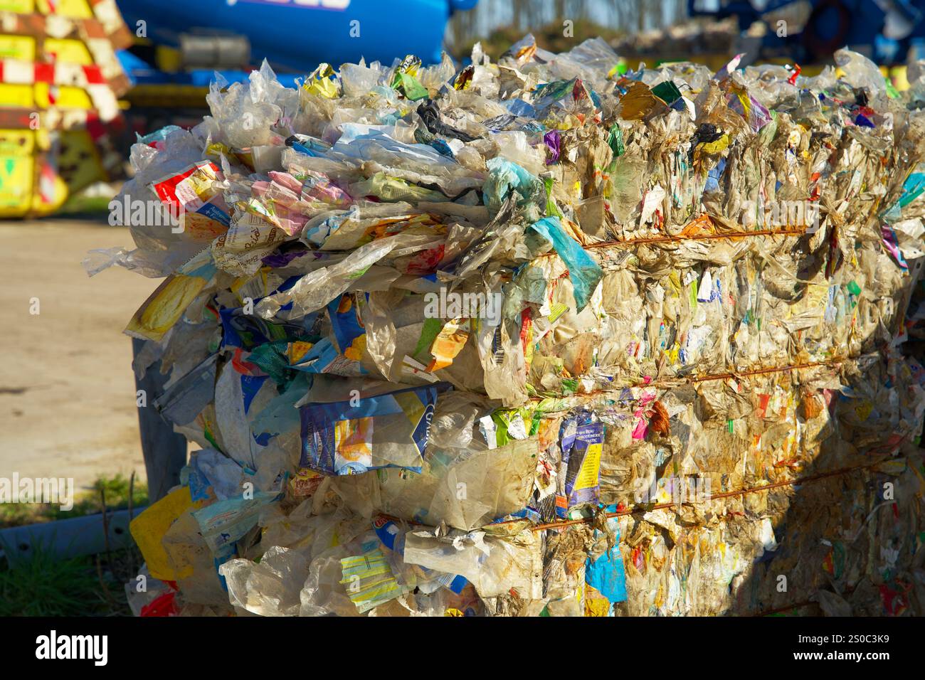 Stack of plastic residual mix waste in a plastic recycling factory ...