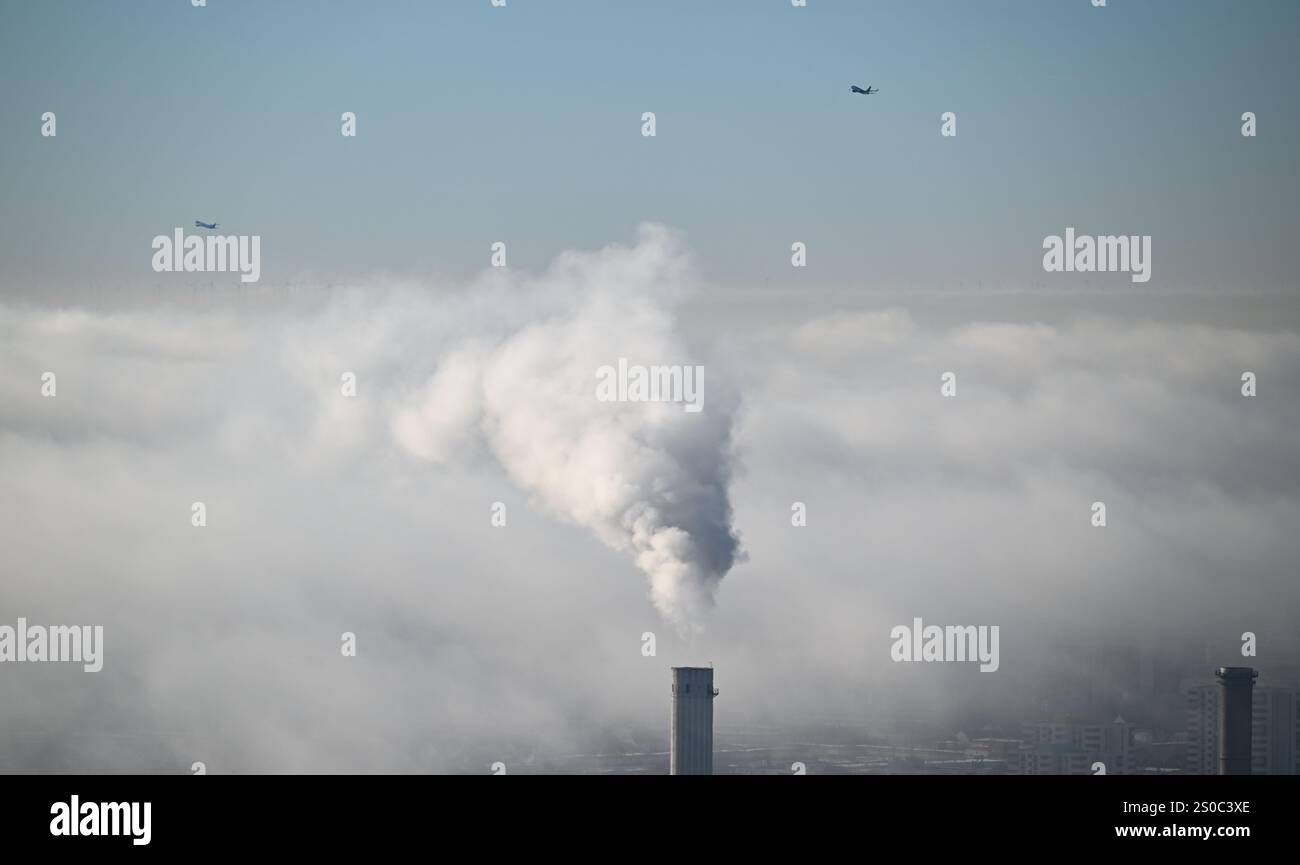 27 December 2024, Hesse, Frankfurt/Main: Two airplanes take off from ...
