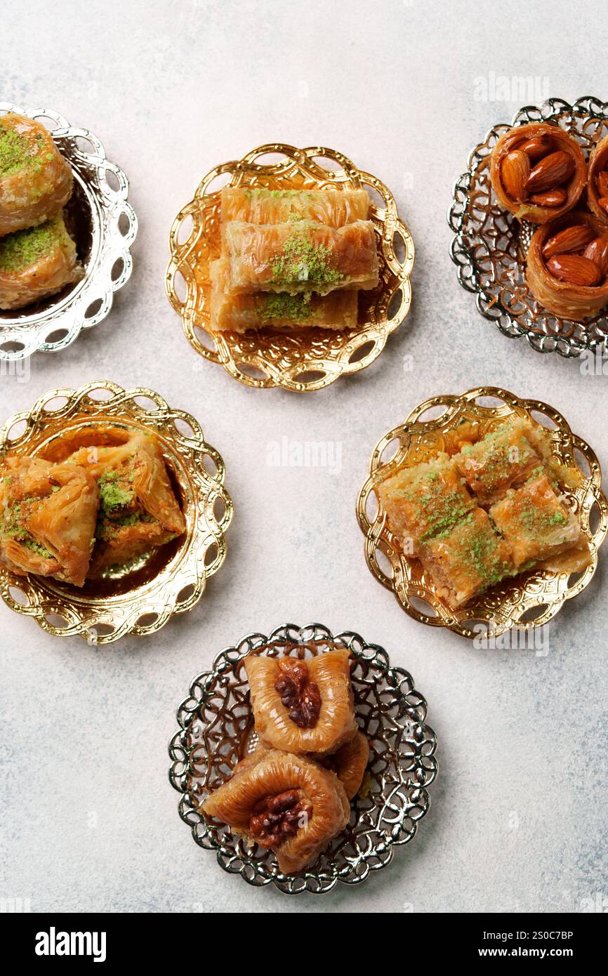 Assorted sweet desserts displayed on decorative plates in a cozy ...