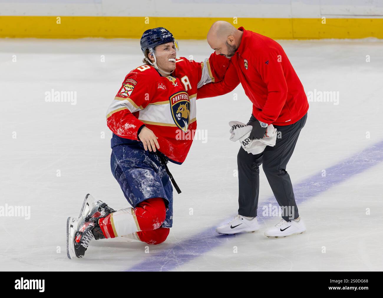 Florida Panthers left-wing Matthew Tkachuk (19) is helped off the ice ...