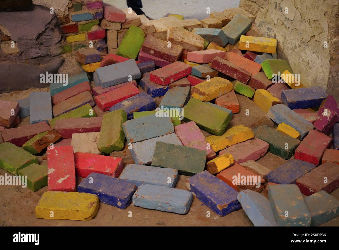 MAUSA VAUBAN, Museum of Urban Art and Street Art, Neuf-Brisach Fortress, France, Europe, Colourful stones and blocks scattered on the floor of a negle Stock Photo