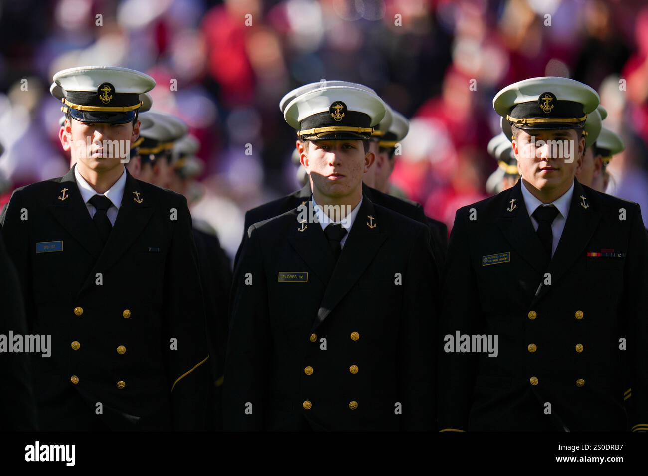 U.S. Navy Midshipmen march on the field prior to the Armed Forces Bowl