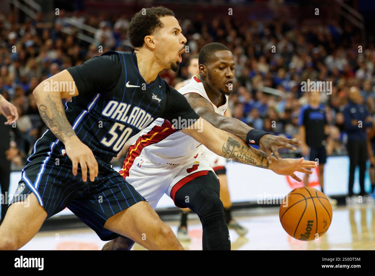 Orlando Magic guard Cole Anthony (50) and Miami Heat guard Terry Rozier ...