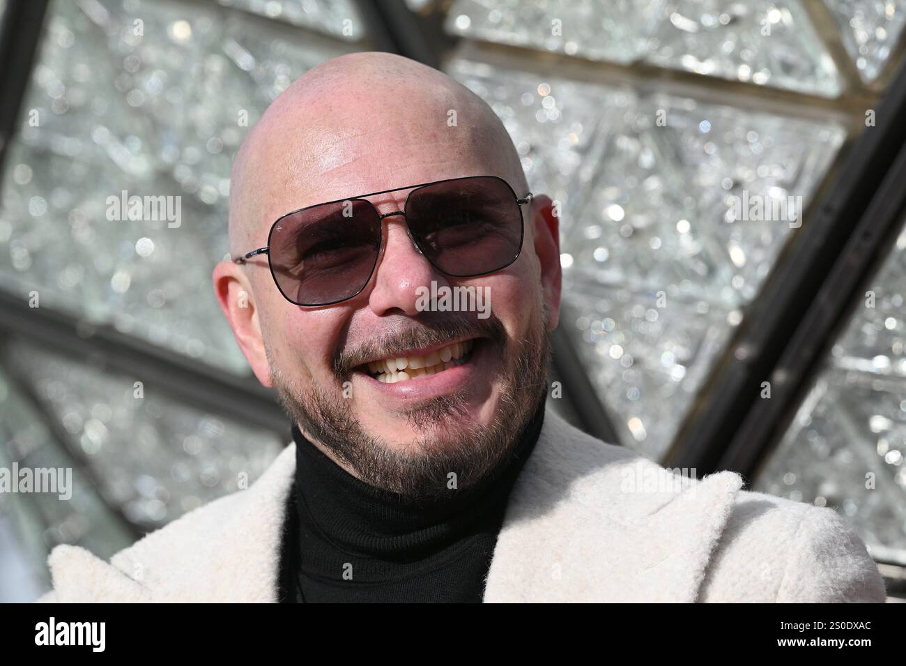 Singer and rapper Pitbull attends the installing of the newly designed ...