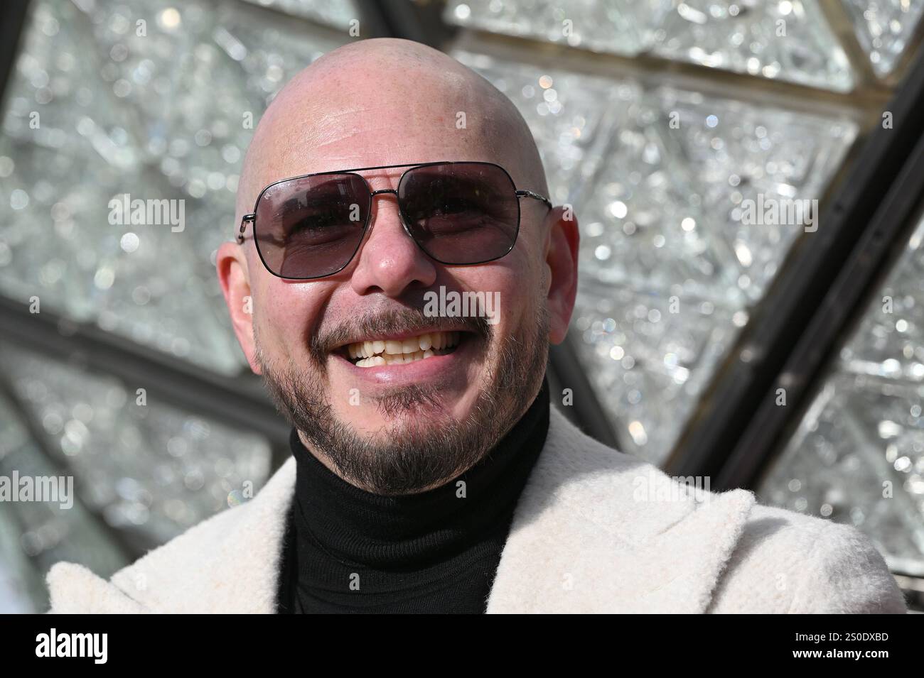 Singer and rapper Pitbull attends the installing of the newly designed ...