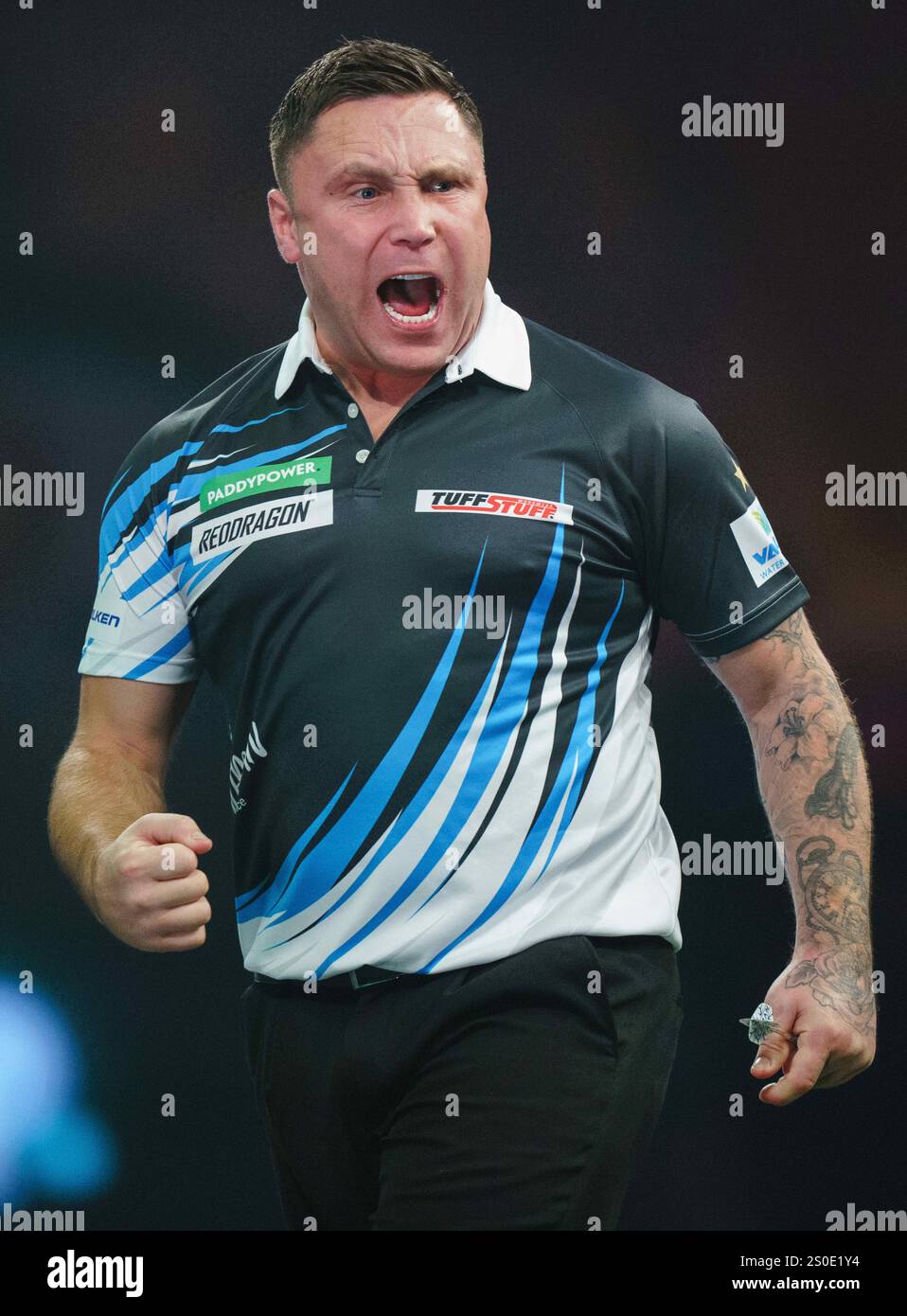Gerwyn Price celebrating during 3rd round match between Gerwyn Price
