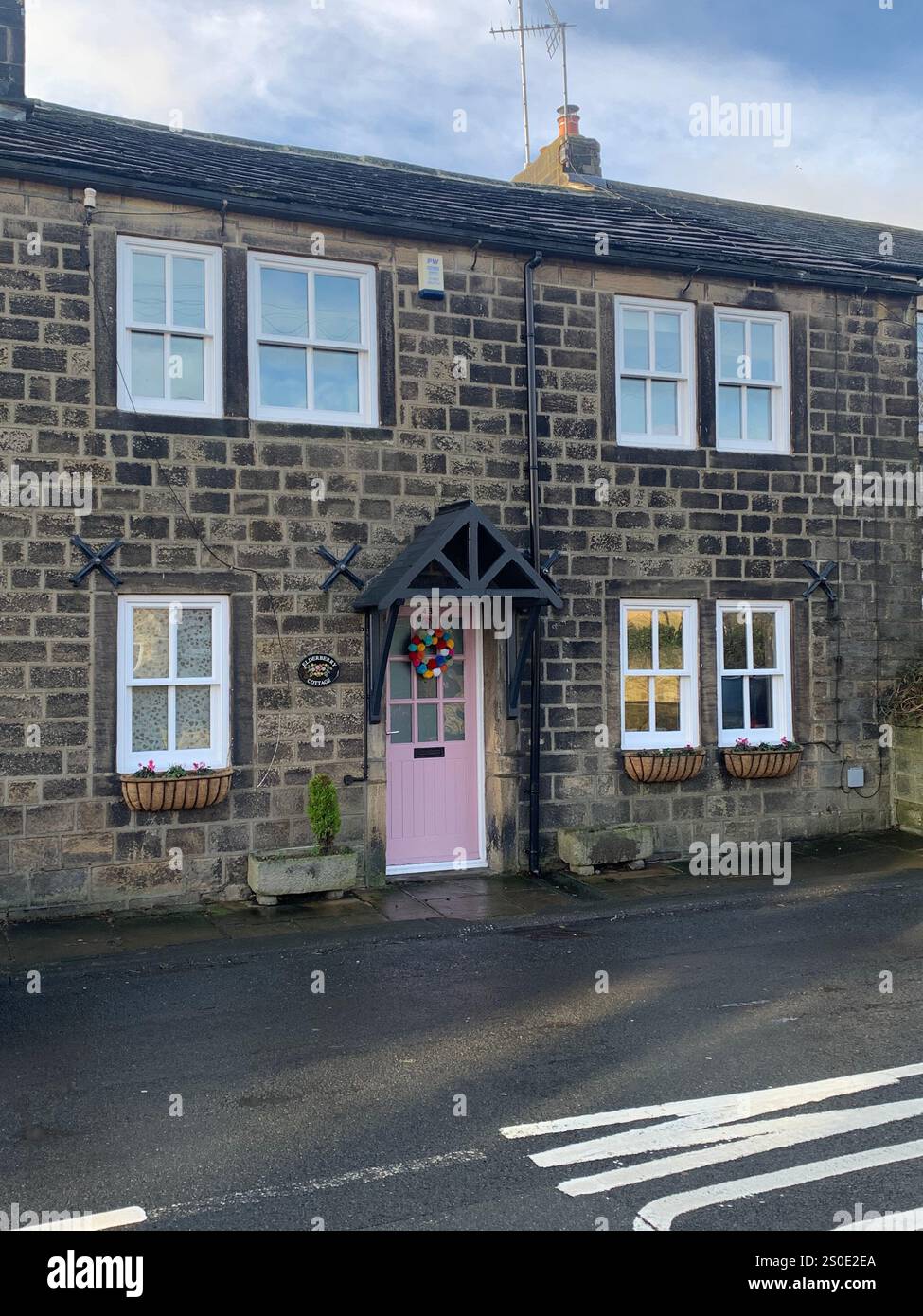 Guiseley North Yorkshire houses trees place town village countryside place sky weather Winter Christmas day place bleak clouds England old types - Smartphone Captured Stock Image