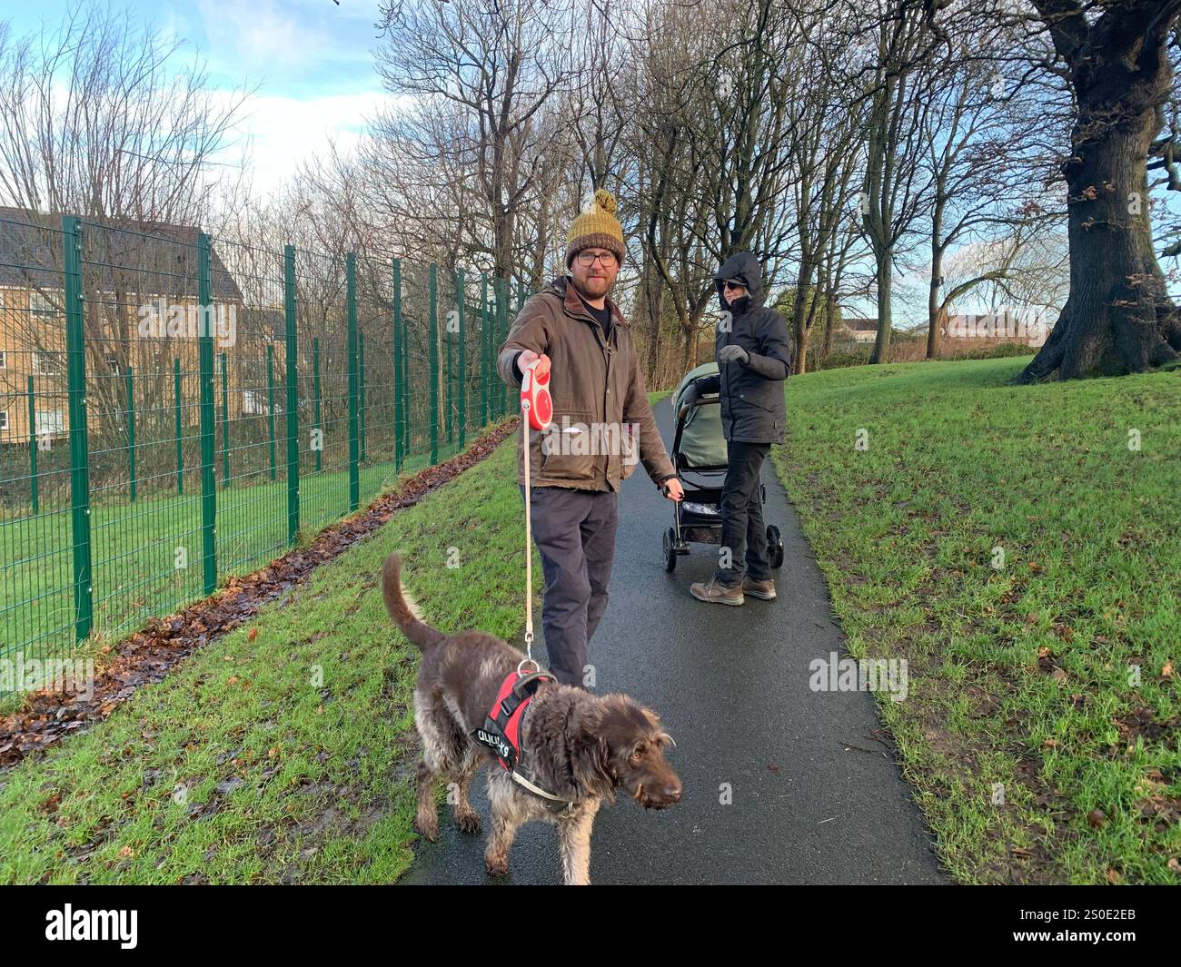 Guiseley North Yorkshire houses trees place town village countryside place sky weather Winter Christmas day place bleak clouds England old types - Smartphone Captured Stock Image