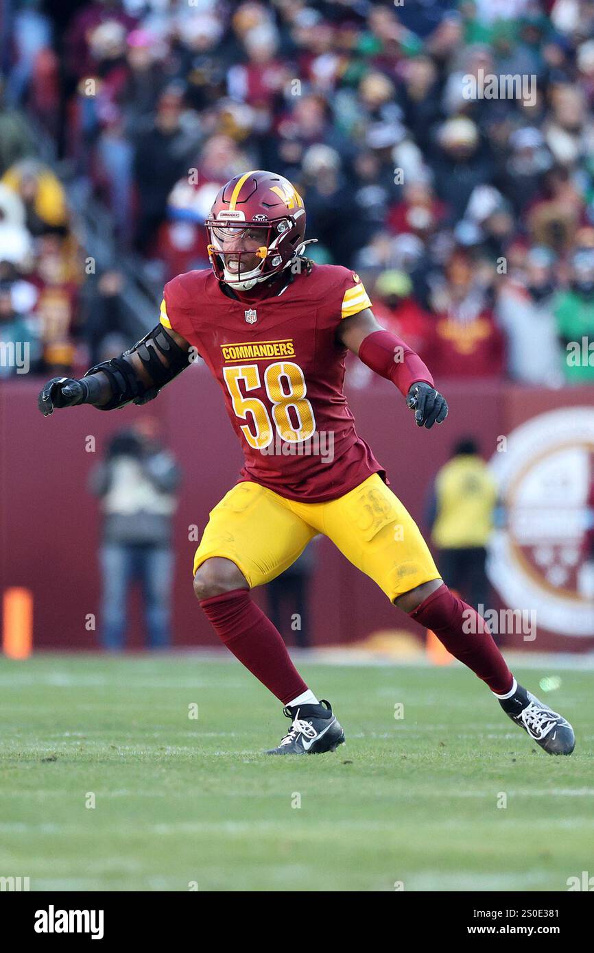 Washington Commanders linebacker Jordan Magee (58) rushes during an NFL