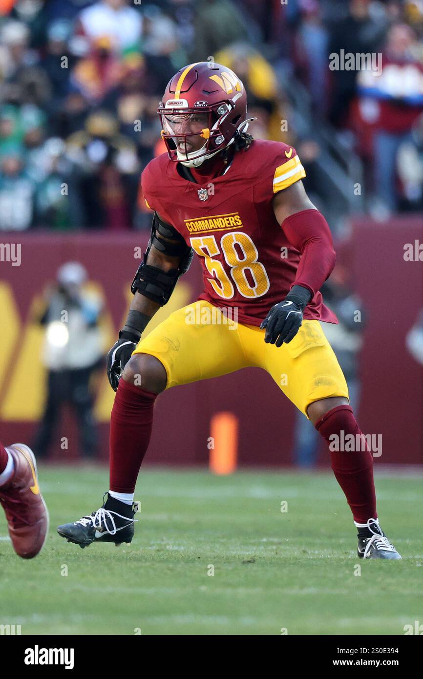 Washington Commanders linebacker Jordan Magee (58) rushes during an NFL
