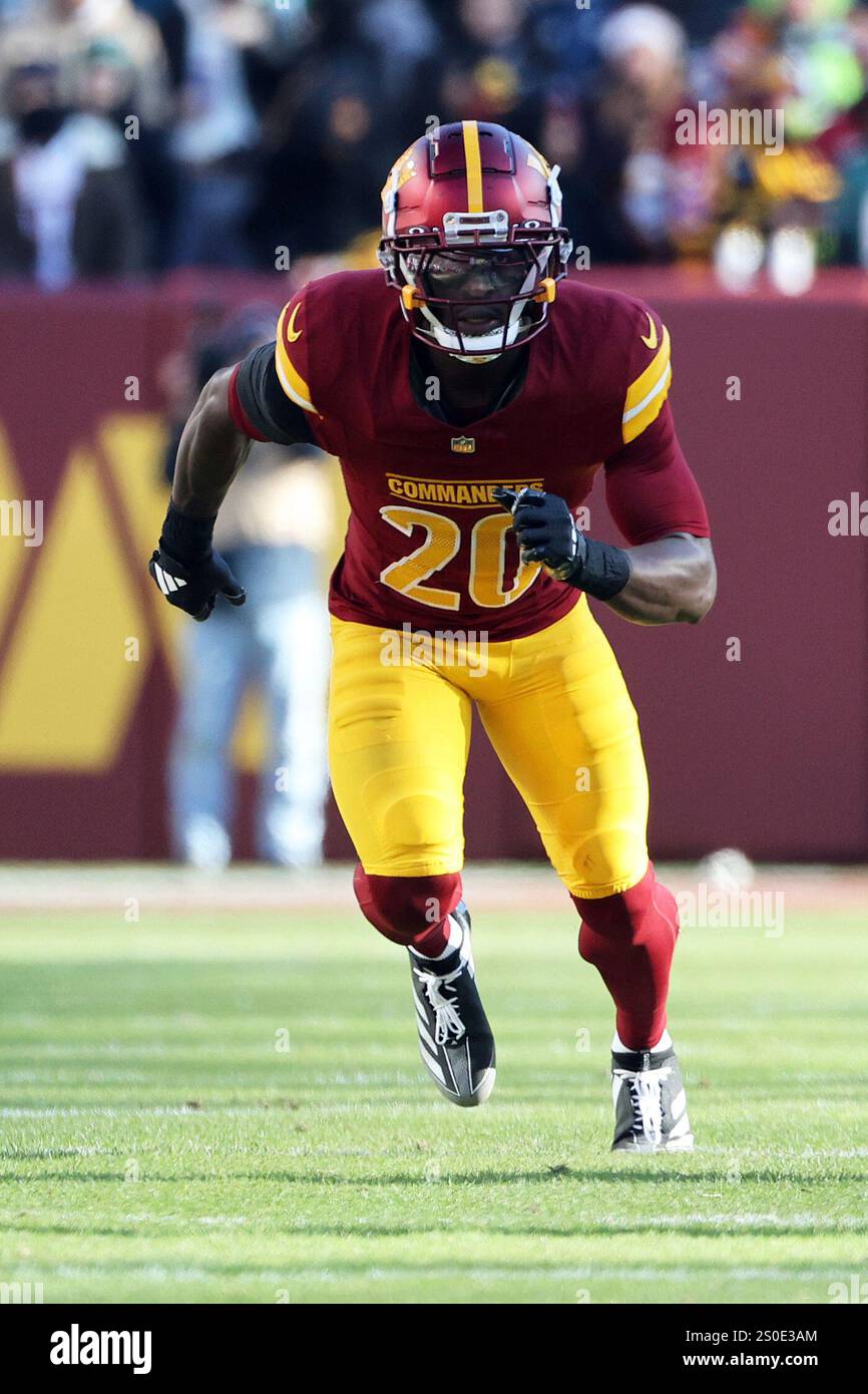 Washington Commanders safety Quan Martin (20) rushes during an NFL