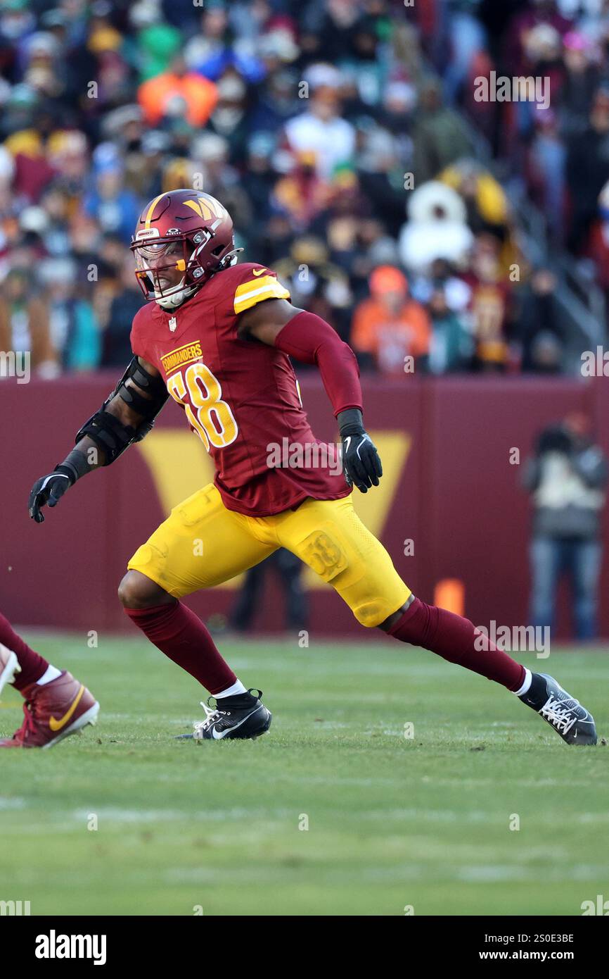 Washington Commanders linebacker Jordan Magee (58) rushes during an NFL