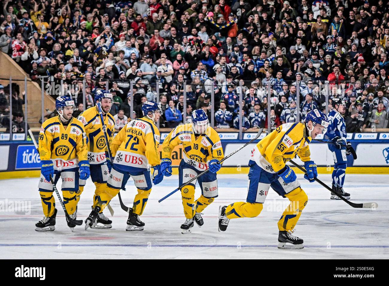 Davos' Calle Andersson, front right, and the team celebrate after