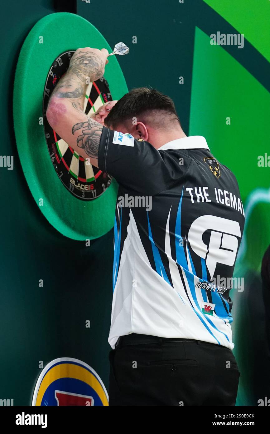 Gerwyn Price celebrating winning after the 3rd round match between
