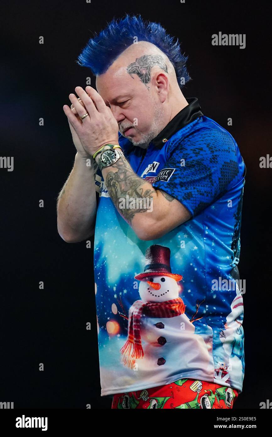 Peter Wright looks dejected during 3rd round match between Jermaine