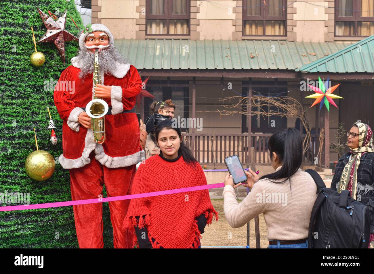 Chirstmas celebrations in Kashmir India A person dressed as Santa Claus ...