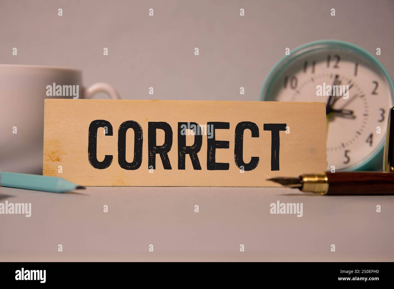 Hand turning the word Incorrect into Correct with red marker isolated ...