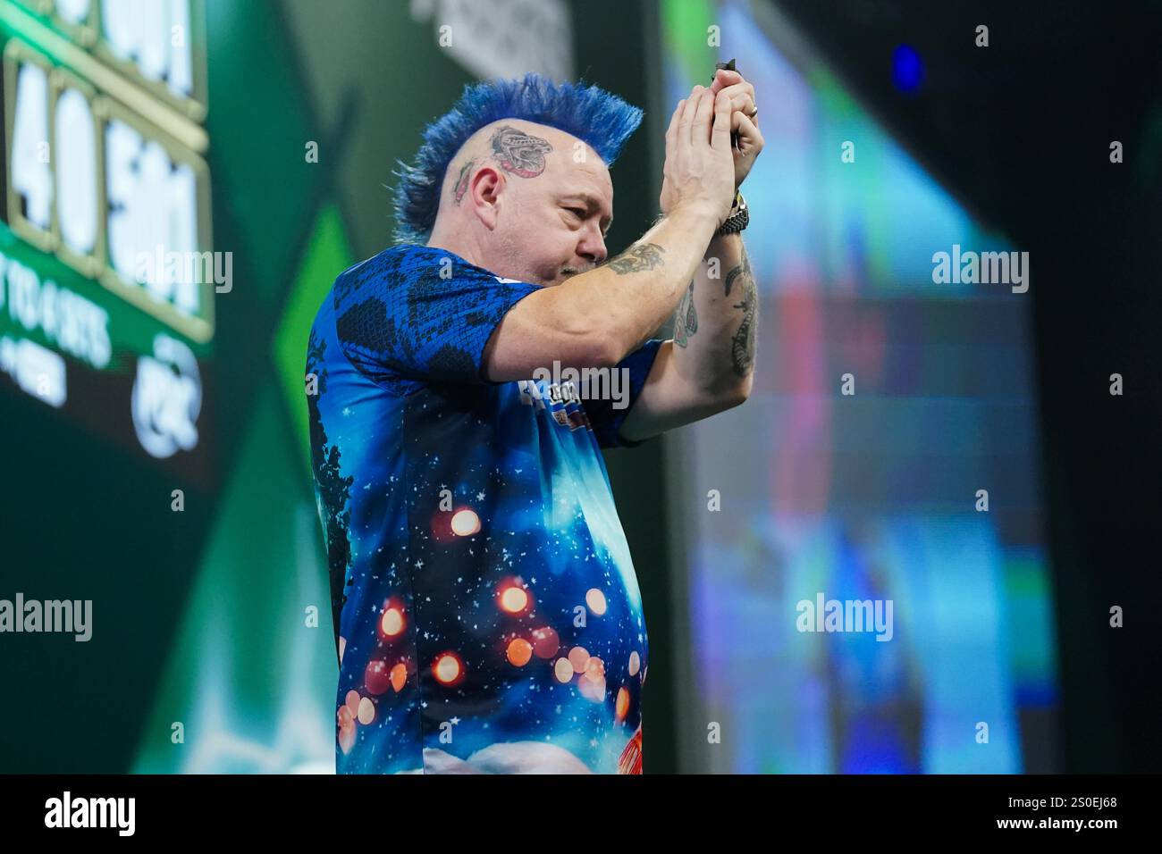 Peter Wright celebrating winning after the 3rd round match between