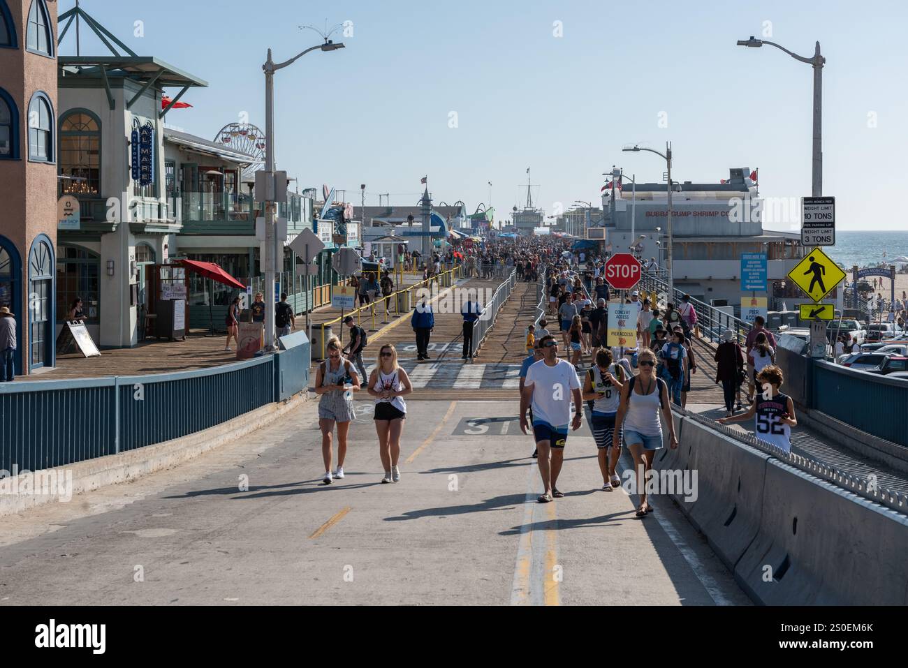 Santa Monica CA USA - August 17, 2017: The Santa Monica Pier contains a small amusement park, concession stands, and areas for views and fishing. Stock Photo