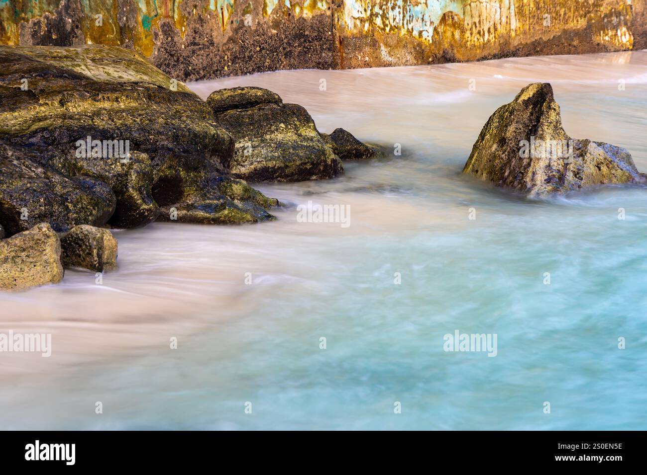 sea shore rock with water mist long exposure shot Stock Photo - Alamy