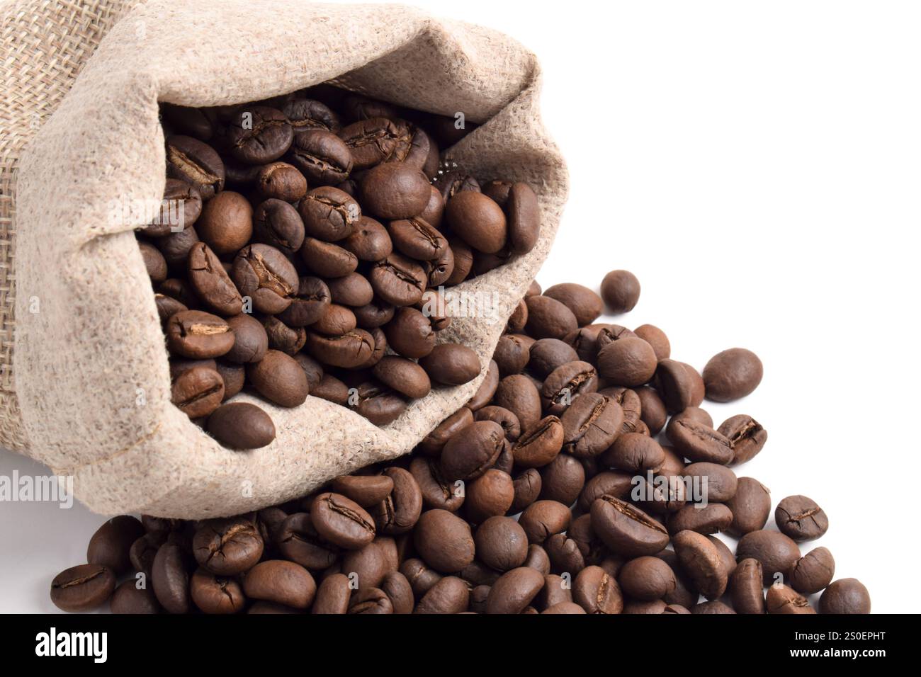 Coffee beans in bag isolated on white background Stock Photo - Alamy