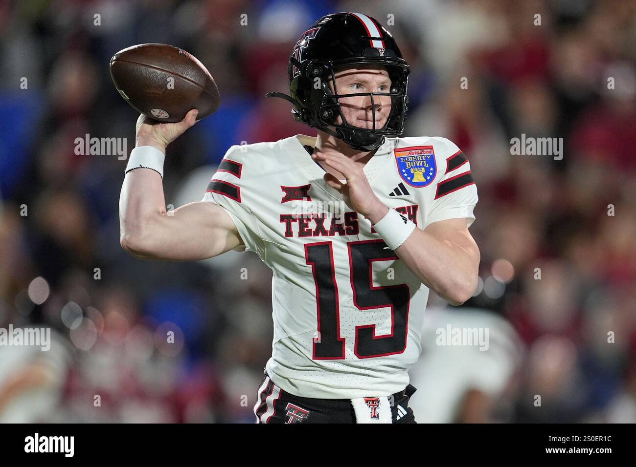 Texas Tech quarterback Will Hammond (15) looks to throw a pass during