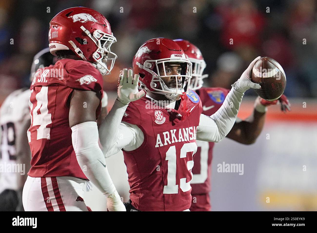 Arkansas defensive back Marquise Robinson (13) celebrates his