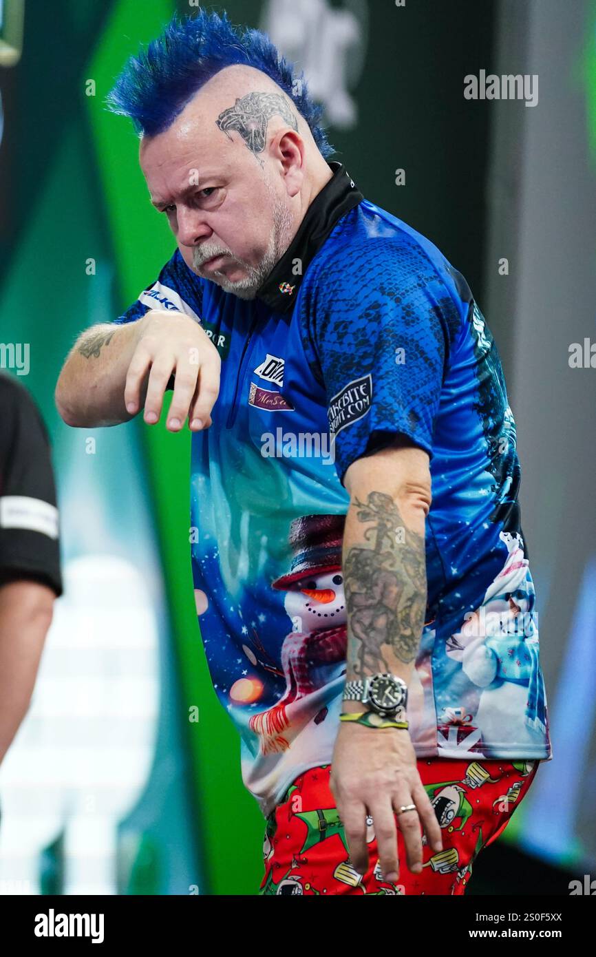 Peter Wright coughing during 3rd round match between Jermaine Wattimena