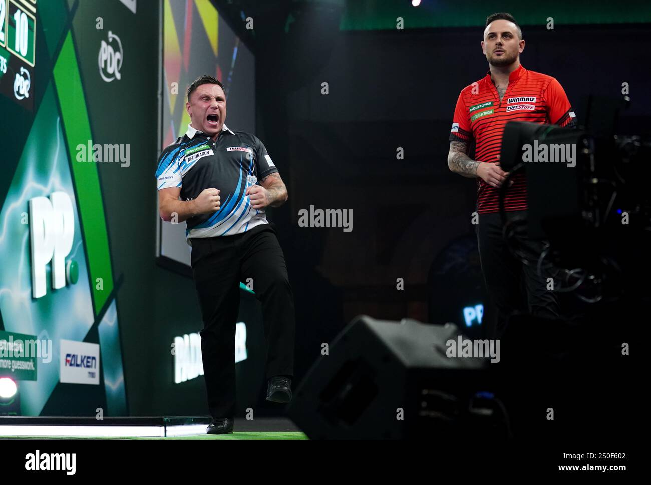 Gerwyn Price celebrating winning during 3rd round match between Gerwyn