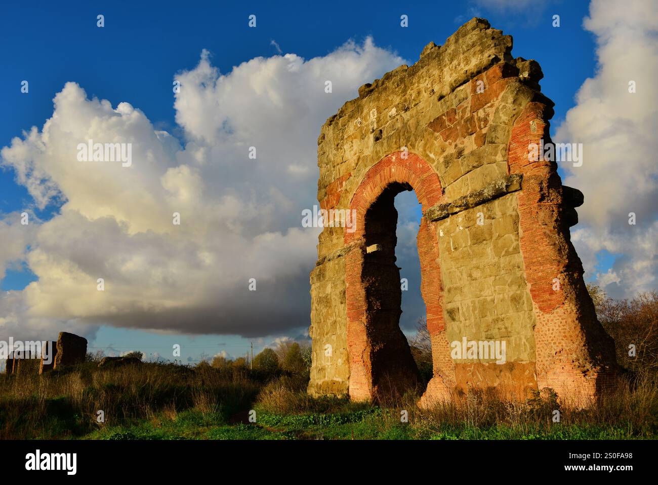 Ancient roman aqueduct beautiful arches ruins in Rome public park at ...