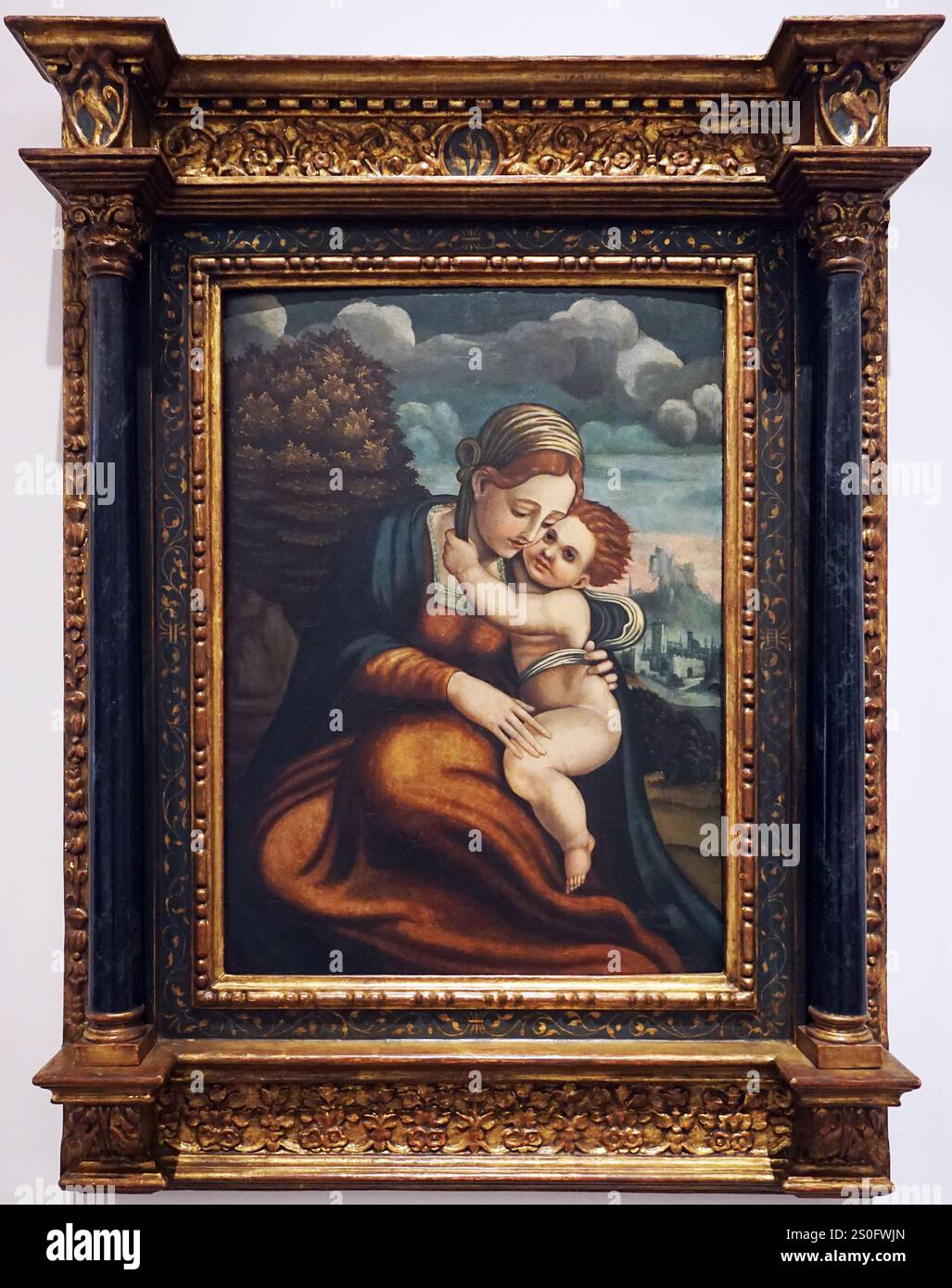 Virgin with child on landscape background / Virgen con niño sobre fondo de paisaje (c. 1518-1525) Attributed to Pedro Machuca / Atribuido a Pedro Machuca (c.1490-1550) Stock Photo