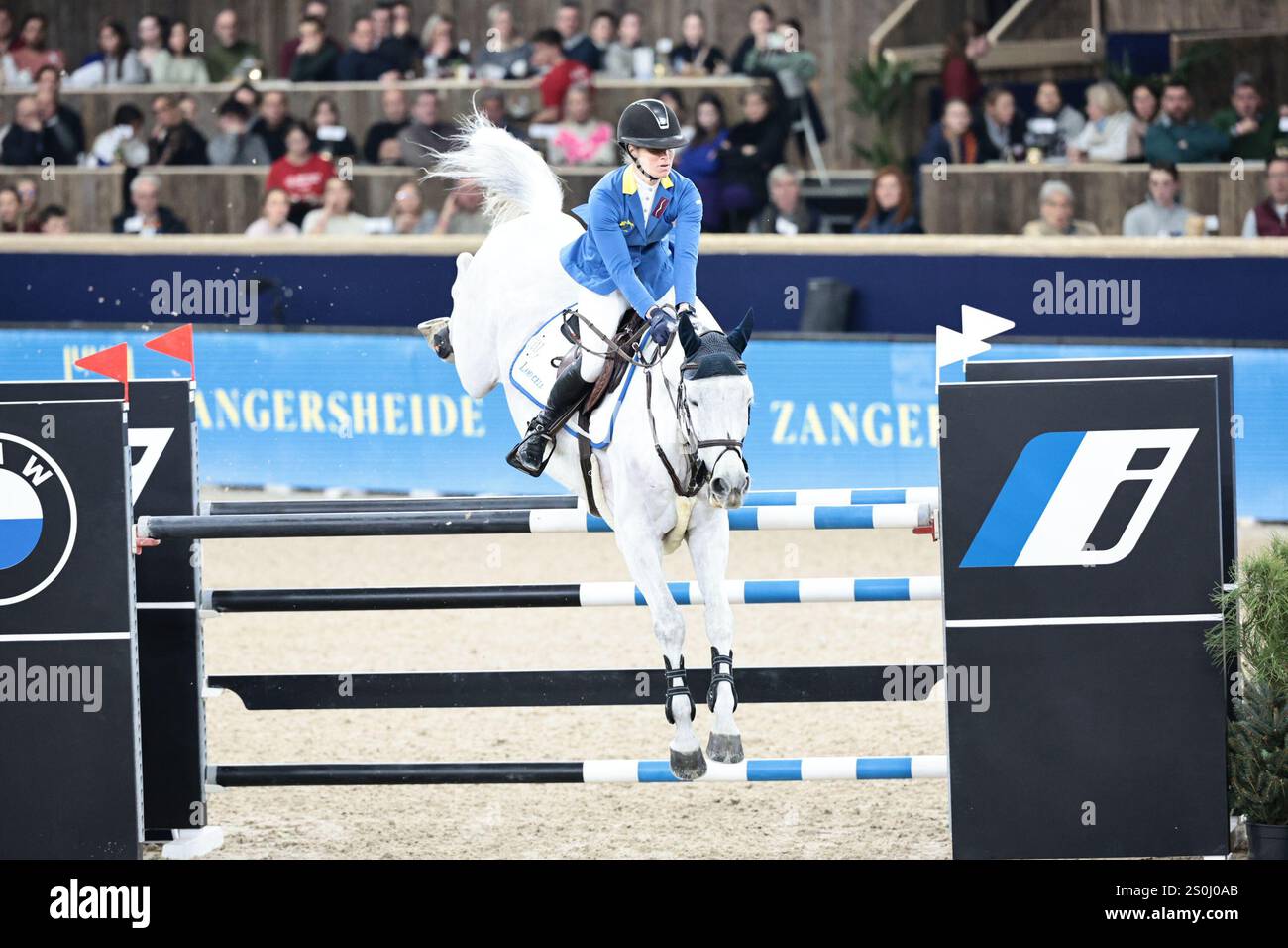 Angelique Rüsen of Germany with Columbus Z during the jump-off of the ...