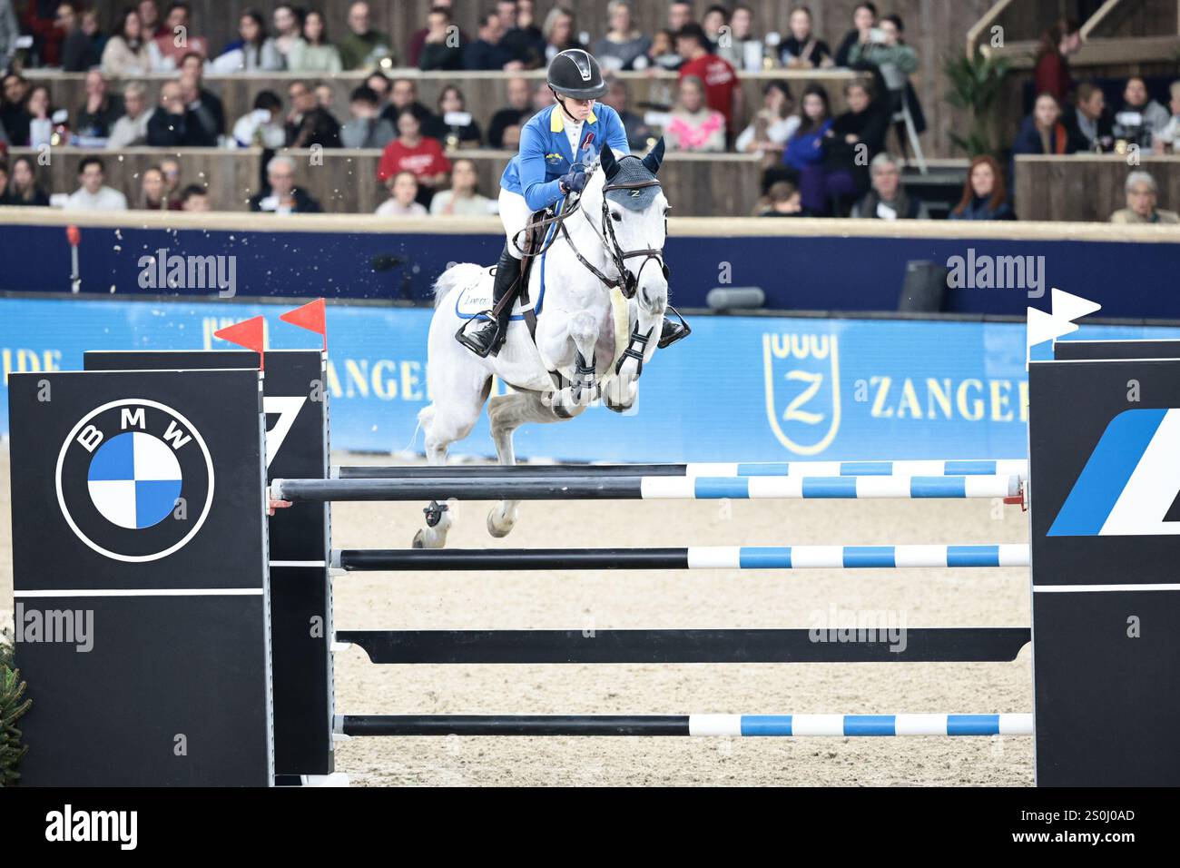 Angelique Rüsen of Germany with Columbus Z during the jump-off of the ...
