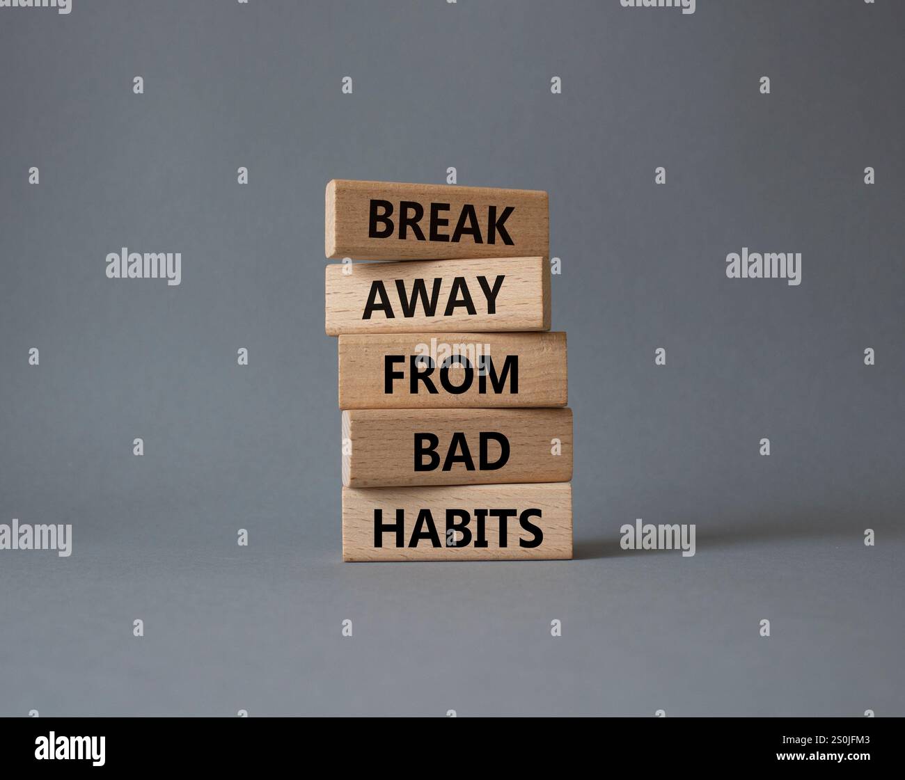 Break away from bad habits symbol. Wooden blocks with words Break away ...