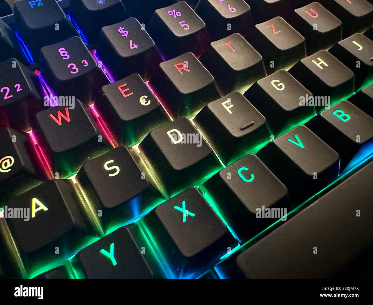 A gaming keyboard with LED lights, concept: gaming - Smartphone Captured Stock Image
