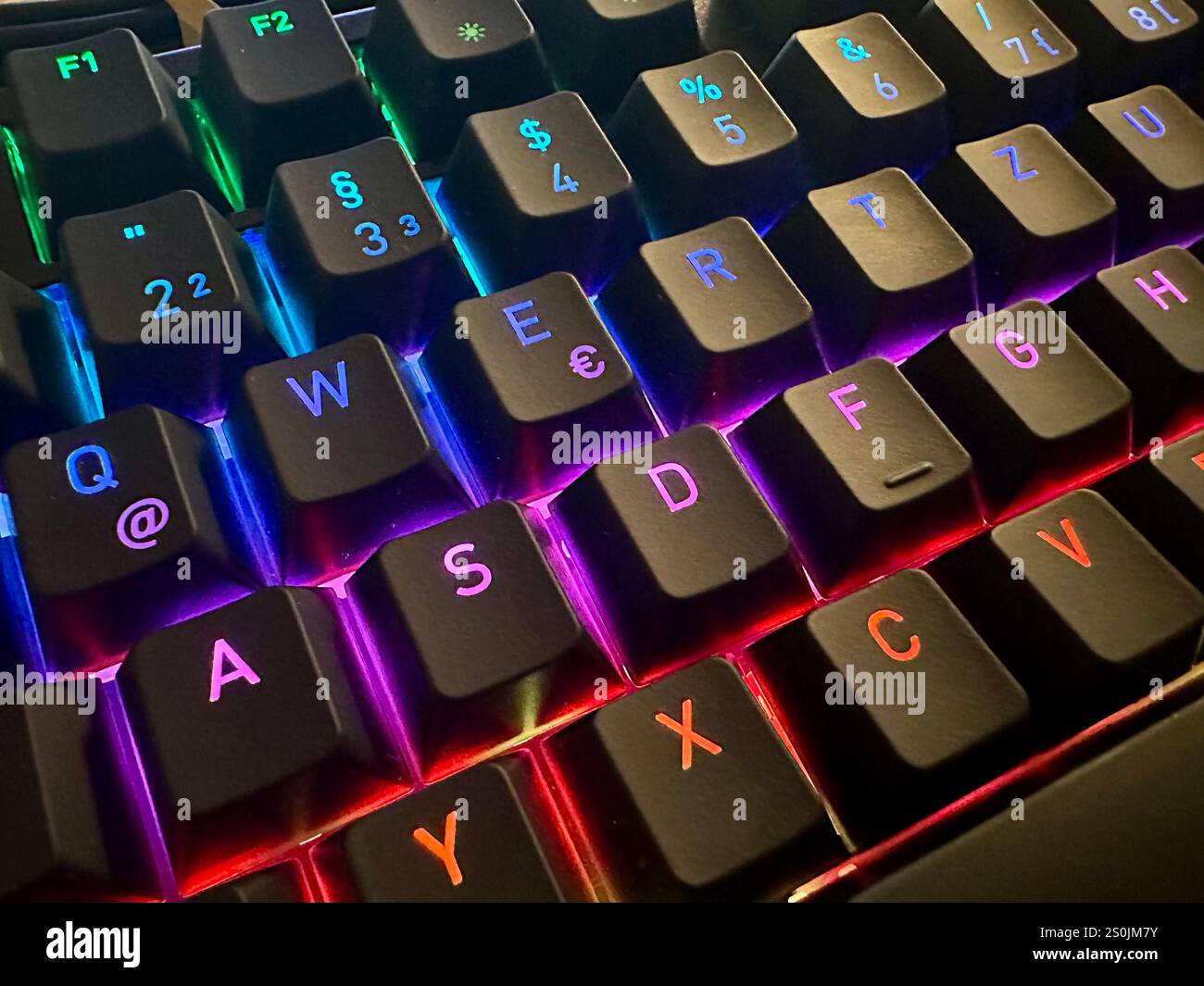 A gaming keyboard with LED lights, concept: gaming - Smartphone Captured Stock Image