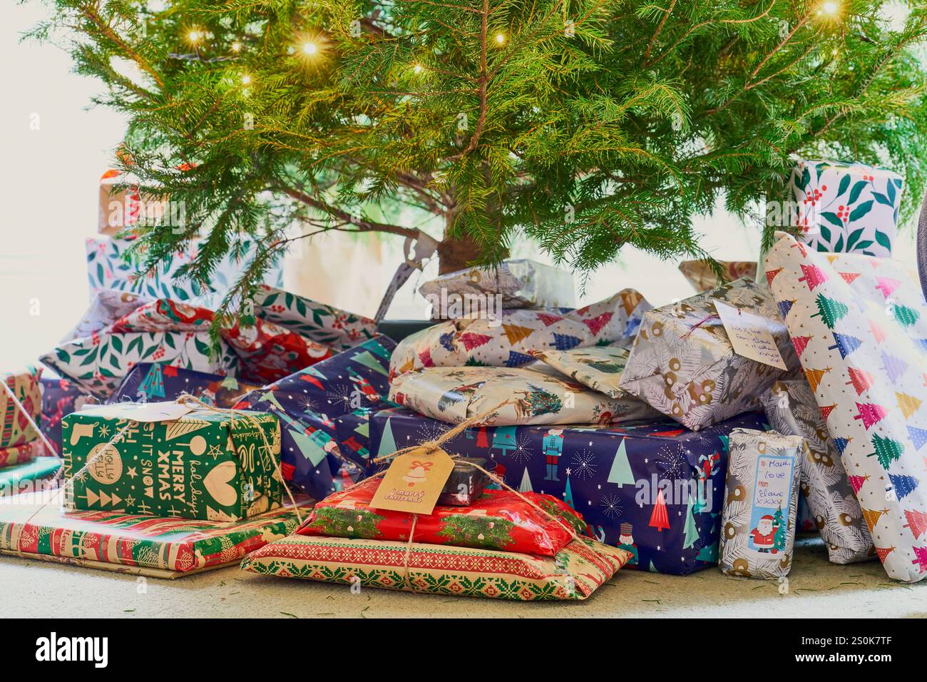 Christmas presents under the tree Stock Photo