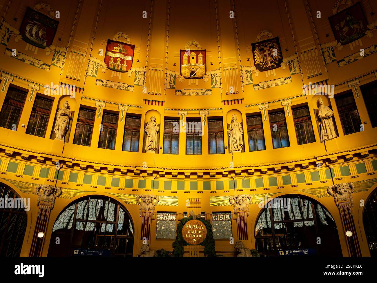 Interior view of a grand hall featuring ornate yellow walls, historical ...