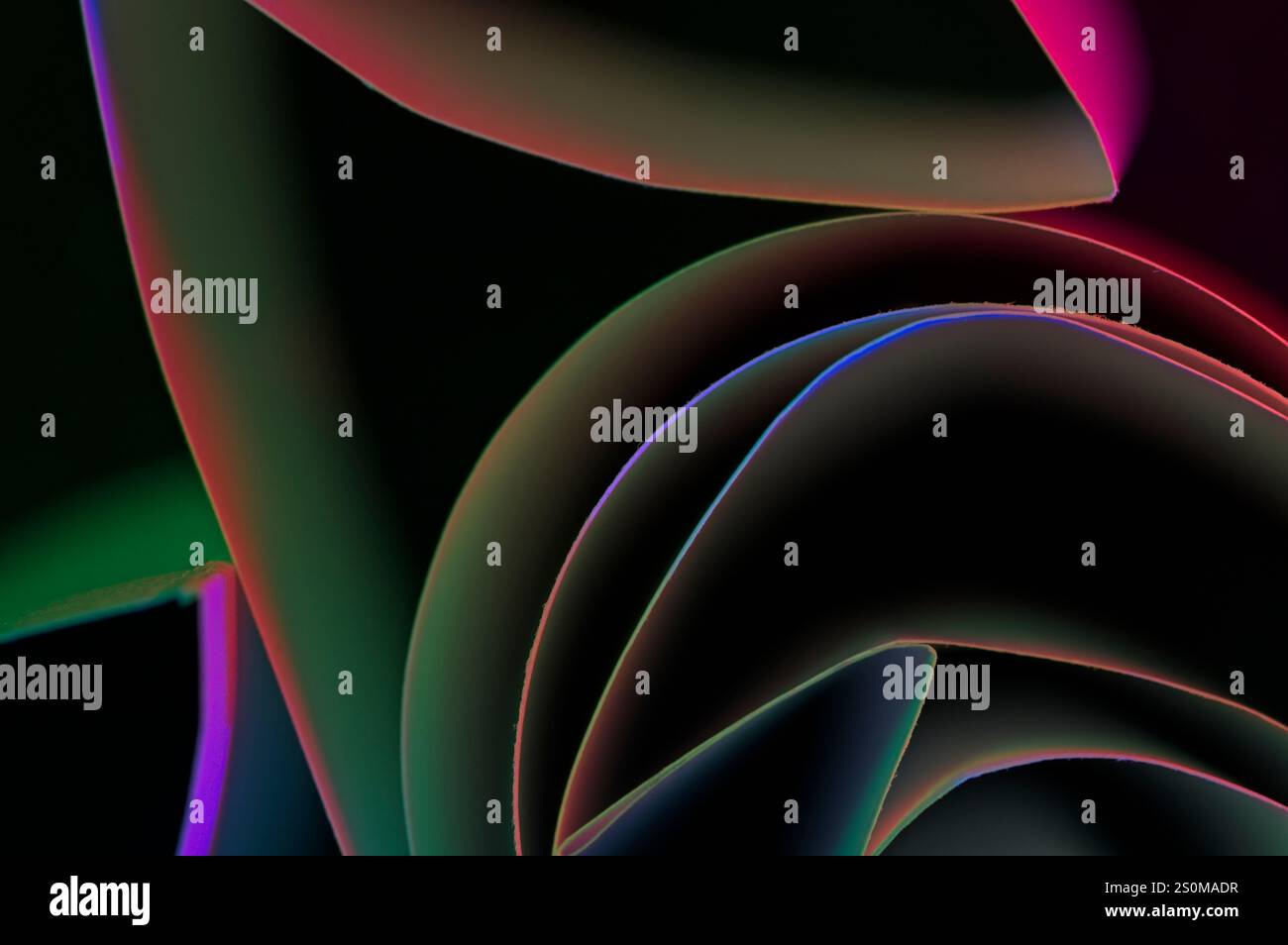 Various lines and shapes in an abstract display of colors on a black ...