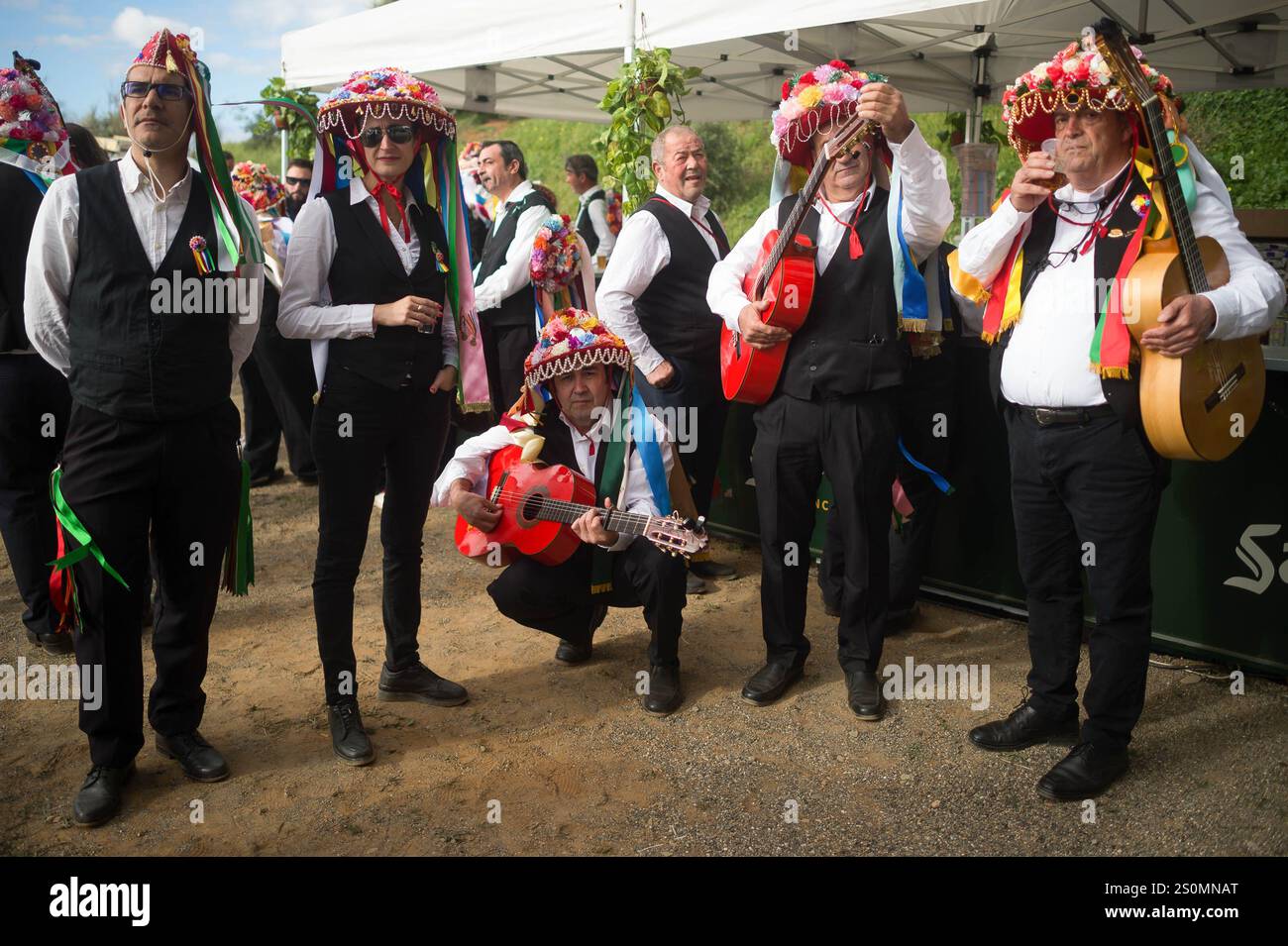 people-wearing-traditional-costume-are-seen-waiting-as-they-prepare