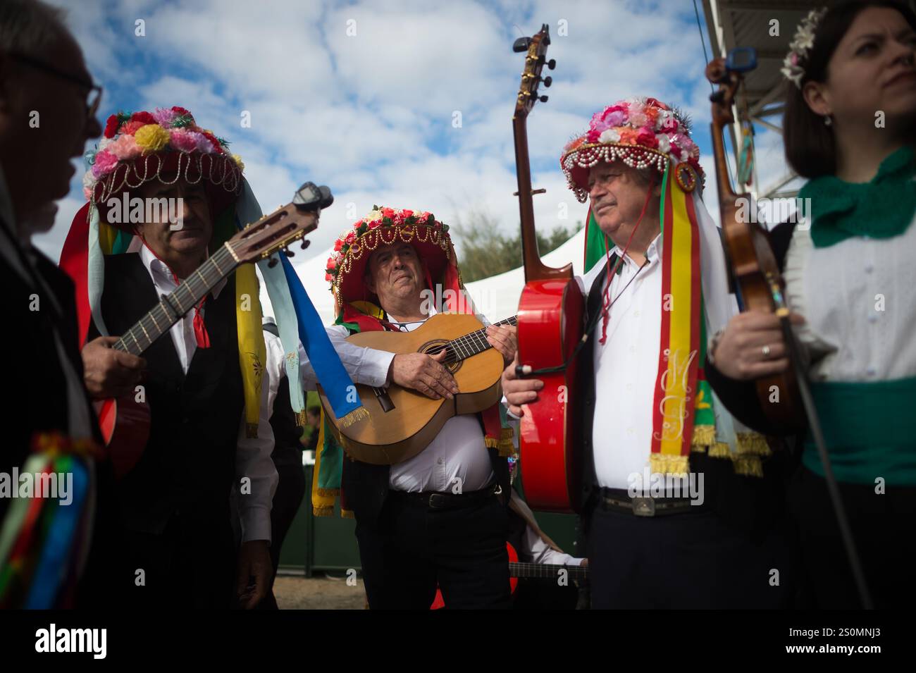 people-wearing-traditional-costume-are-seen-waiting-as-they-prepare