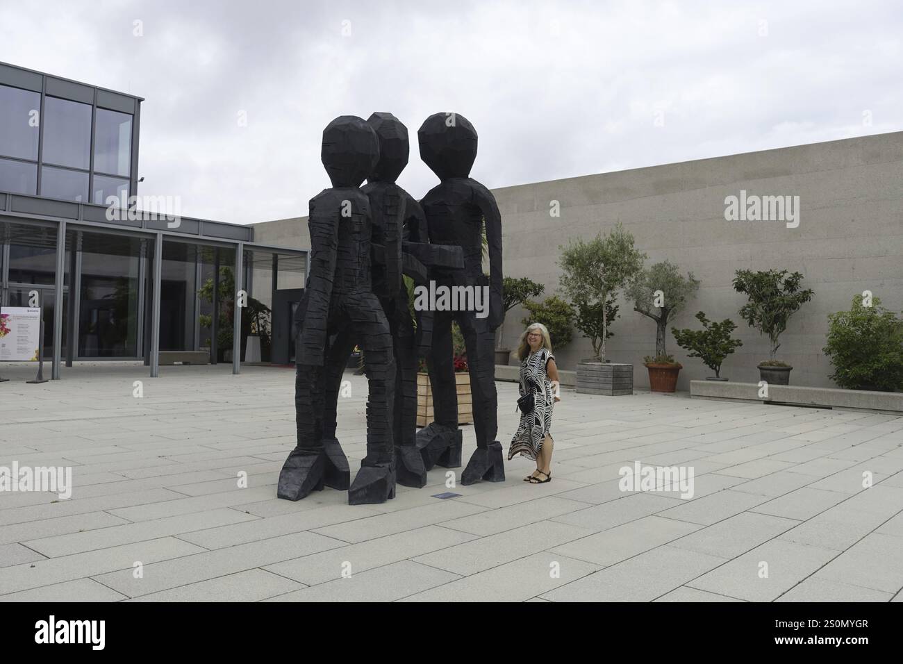 Wuerth Museum 2, Three modern stylised human sculptures in the outdoor ...