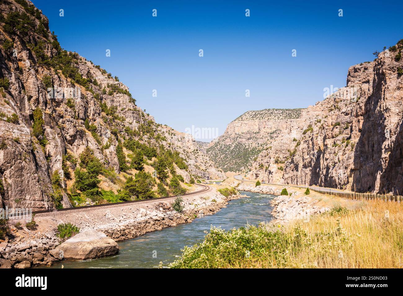 Scenic view of Wind River, road, and railroad tracks from Boysen State Park in Wyoming. Stock Photo