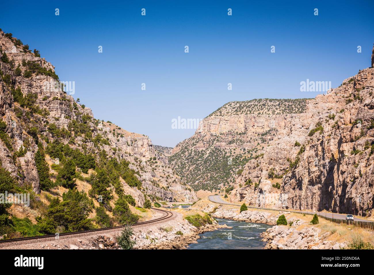 Scenic view of Wind River, car on road, and railroad tracks from Boysen State Park in Wyoming. Stock Photo